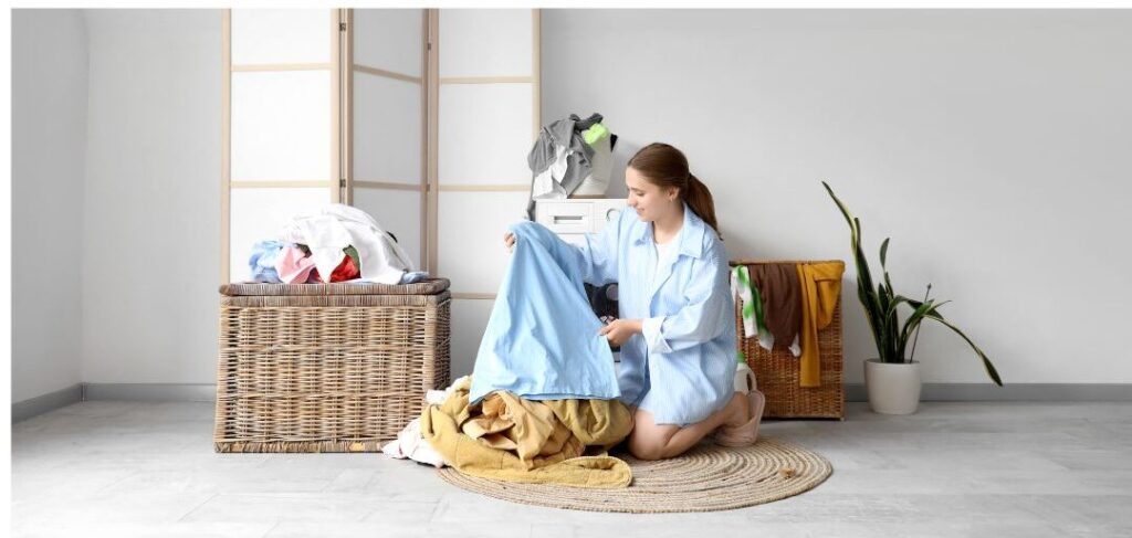 woman sorting linen laundry calmly in organized sunny room