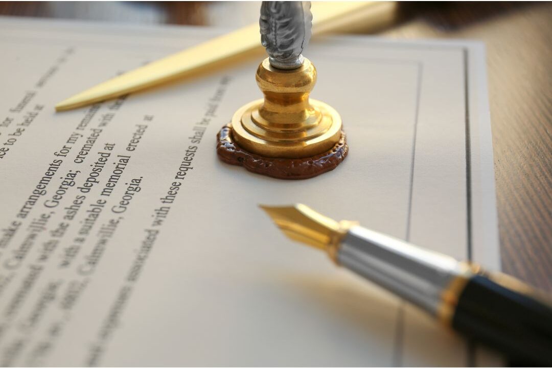 official legal trust document with gold seal on dark desk