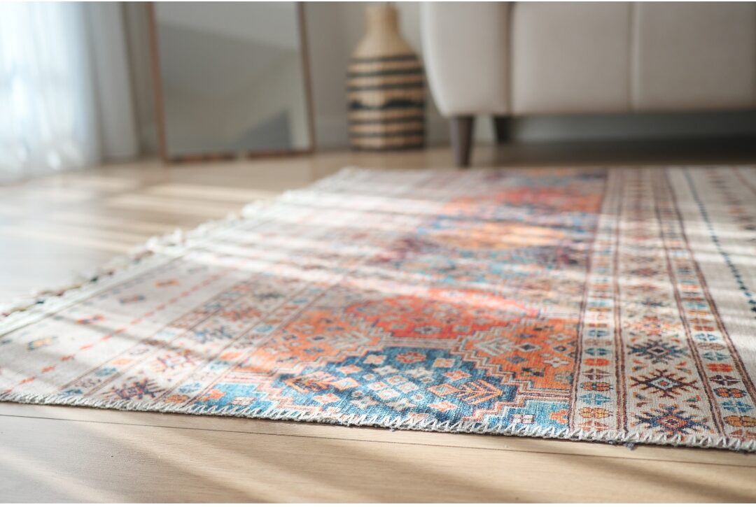long woven runner rug sitting in a bright sunlit home hallway