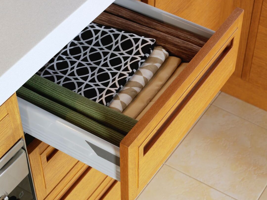 marble pattern contact paper lined inside kitchen drawer presenting 70 budget-friendly home upgrades that are actually worth it
