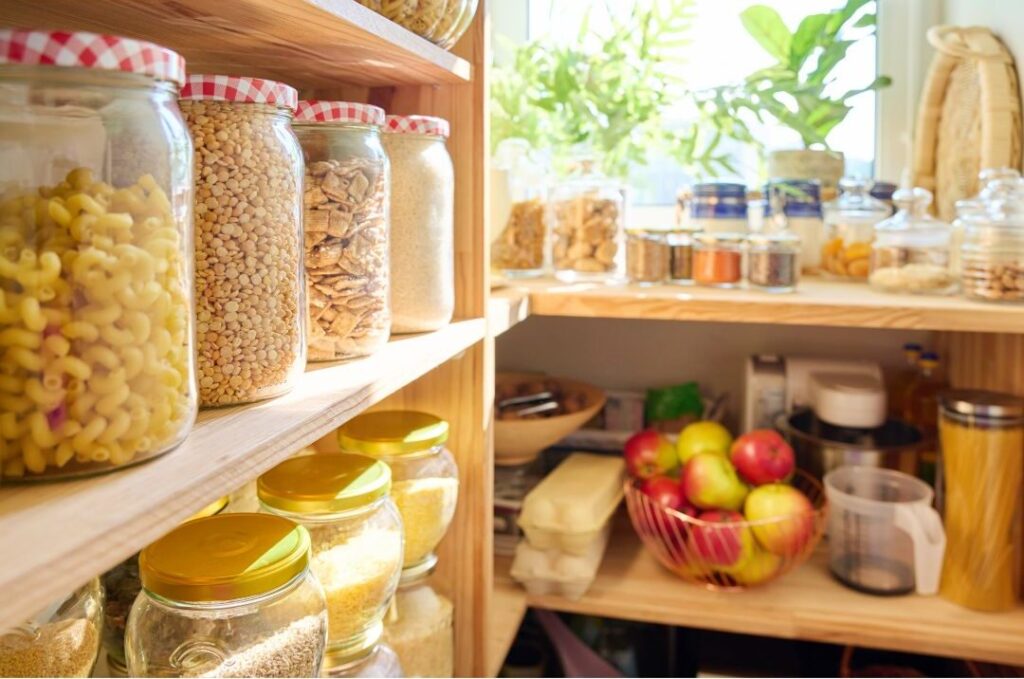 neatly organized kitchen pantry illustrating grocery budget savings
