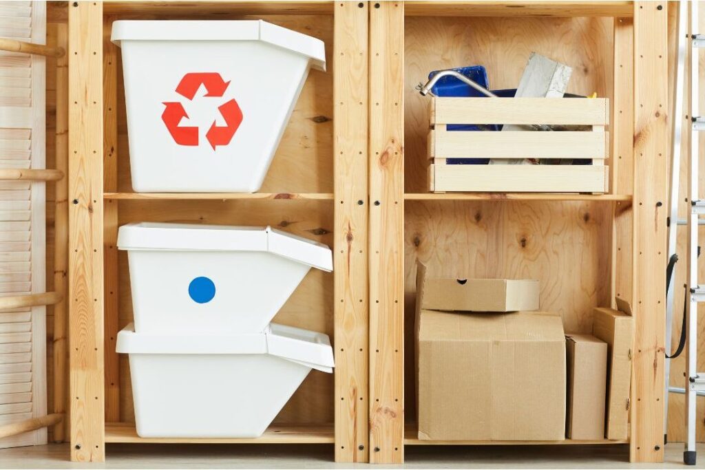 open shelving with mismatched plastic storage bins and containers