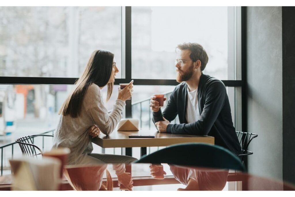 couple discussing family schedules calmly at dining table