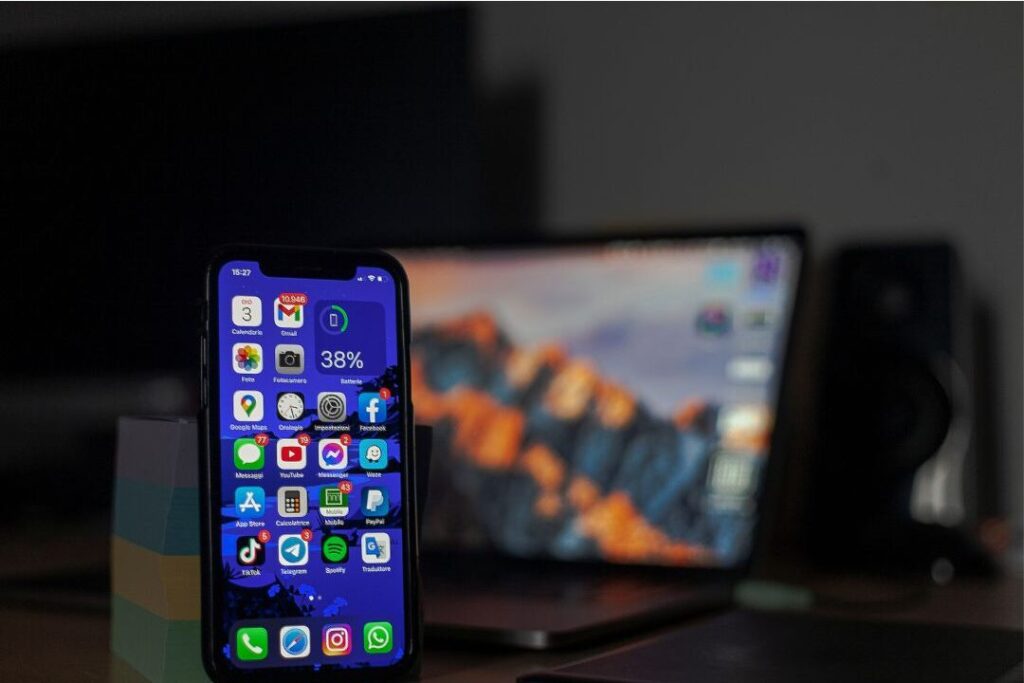 smartphone displaying monthly subscription apps illustrating hidden overhead leaks
