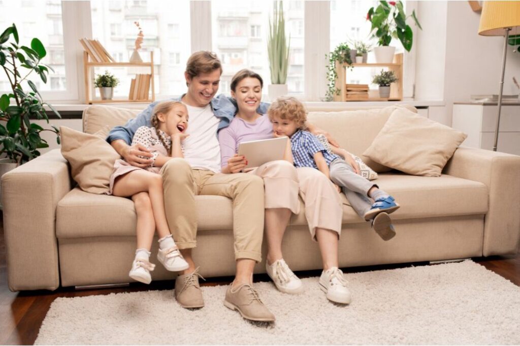 relaxed family in living room illustrating financial peace and confidence