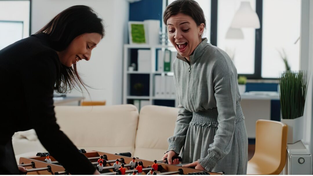 mother laughing warmly while playing board game with child enjoying authentic connection