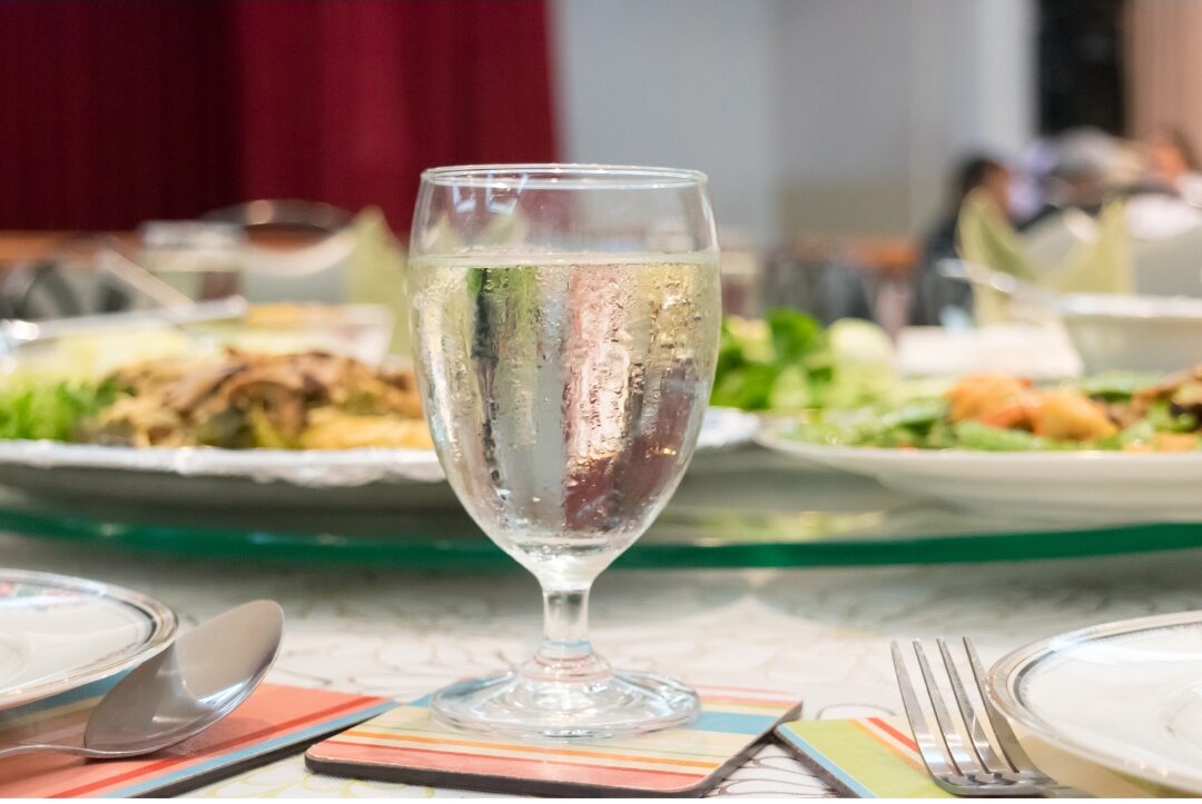 water glass on dining table