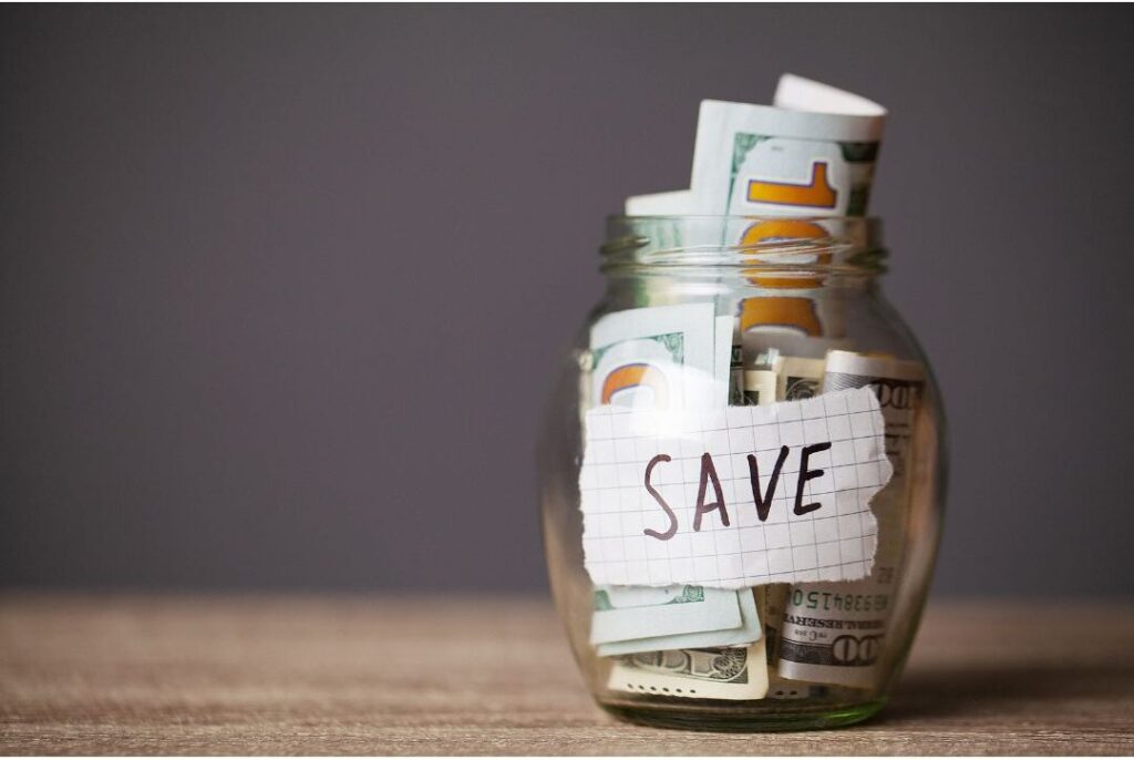 glass jar with savings illustrating paying yourself first