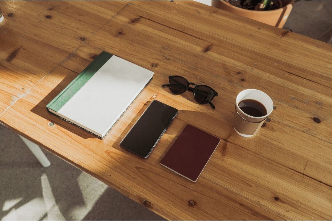 smartphone lying face down on clean wooden table
