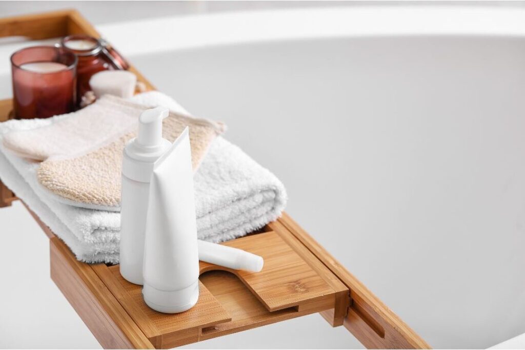 organized bathroom tray with skincare products and clean towels