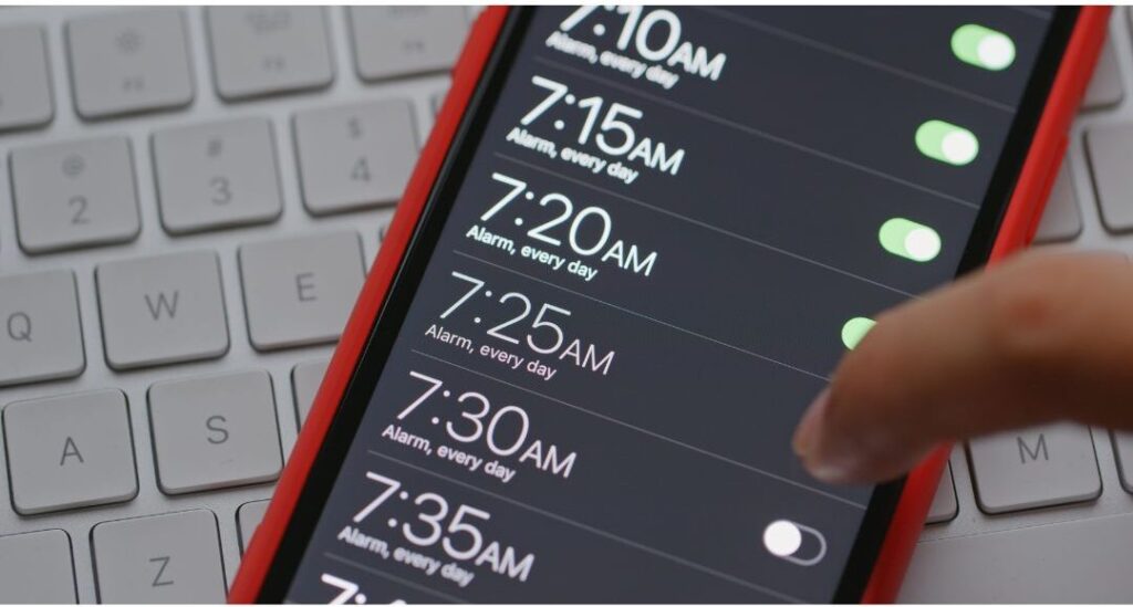 smartphone setting calendar alarm showing the surprisingly simple habit that saved our family budget