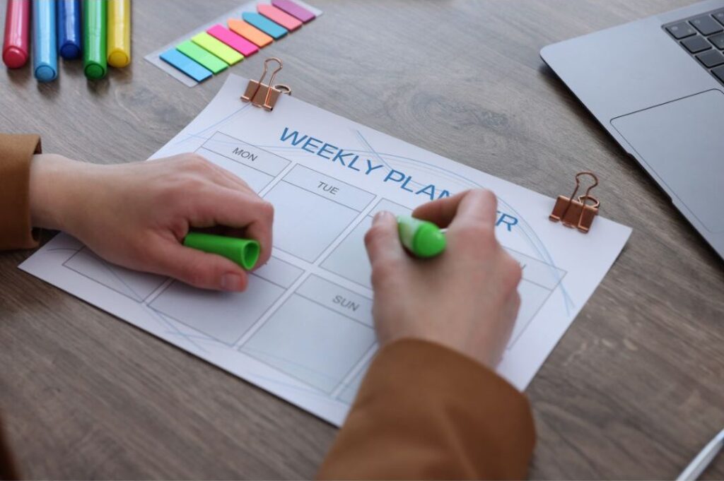 family calendar planner used during weekly cash flow planning