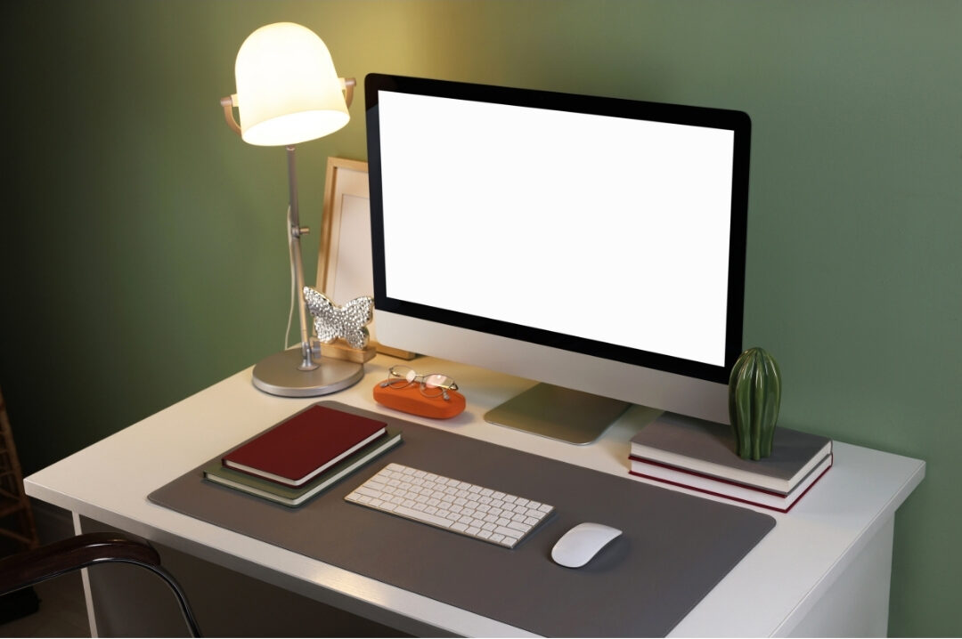 tidy desktop surface with one lamp notebook and wireless mouse