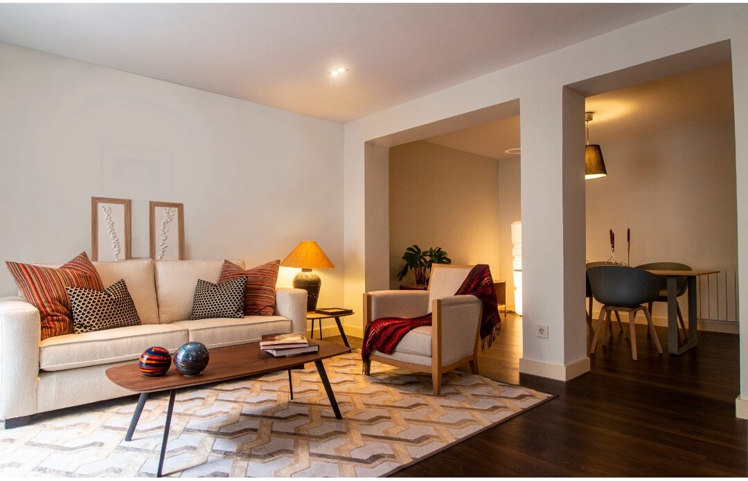 cozy living room with comfortable furniture and warm sunlight releasing perfectionist standards