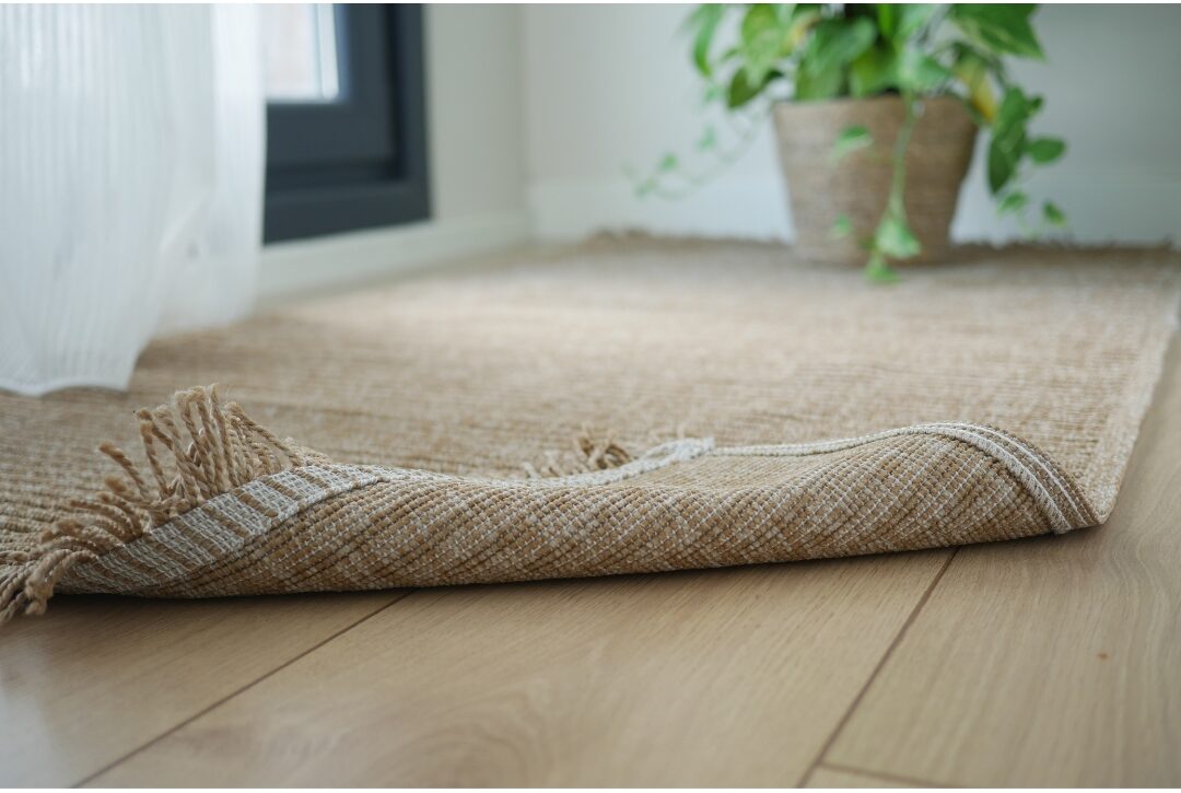 long vintage style woven runner rug in bright clean wooden hallway