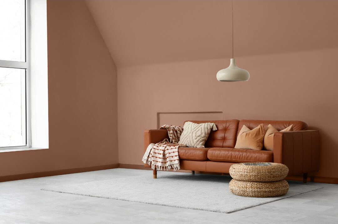 woven floor poufs and leather cushions arranged near low coffee table showcasing 40 cozy home ideas you'll want to copy